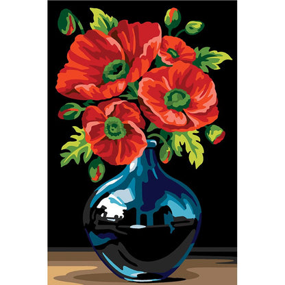 Vaso nero di fiori rossi