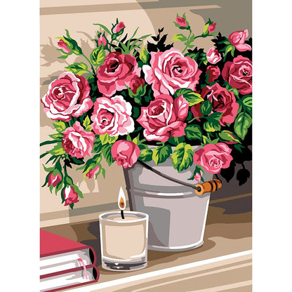 Il vaso di fiori e la candela