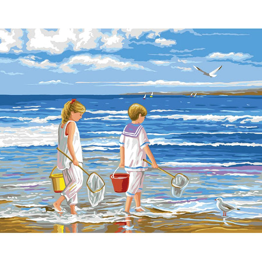 Bambini con retino sulla spiaggia