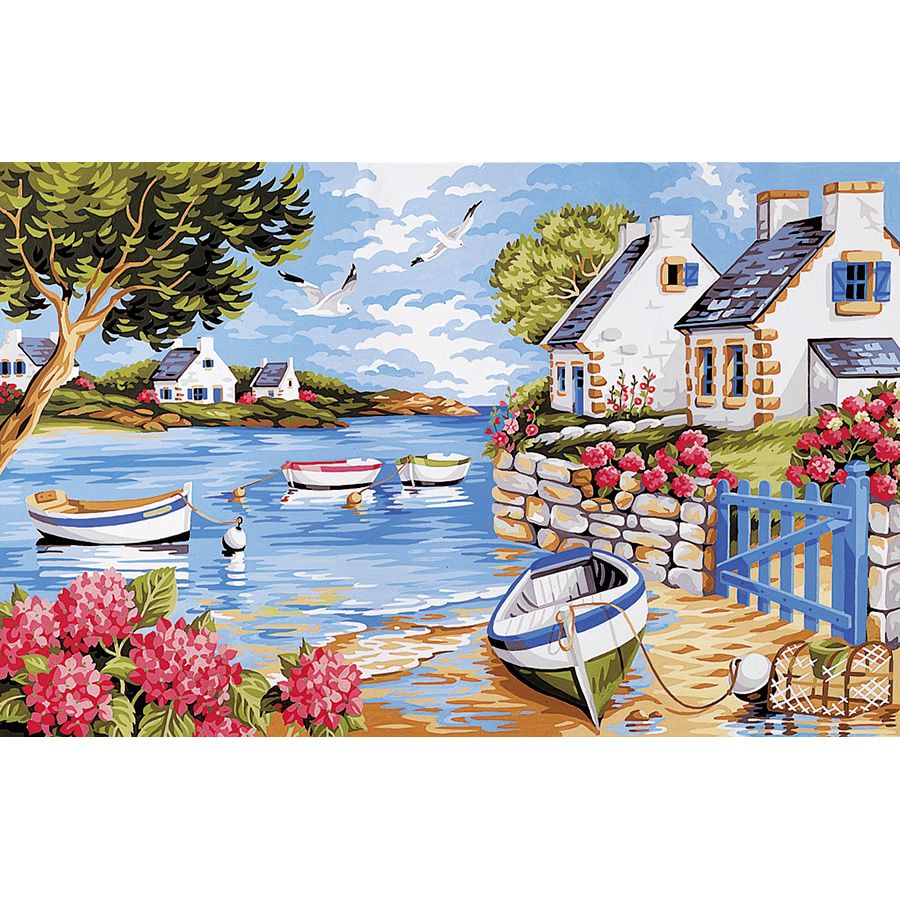 Le barche le case e i fiori al mare