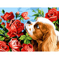 Cagnolino che annusa le rose