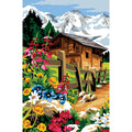 Casa e strada tra i fiori in montagna