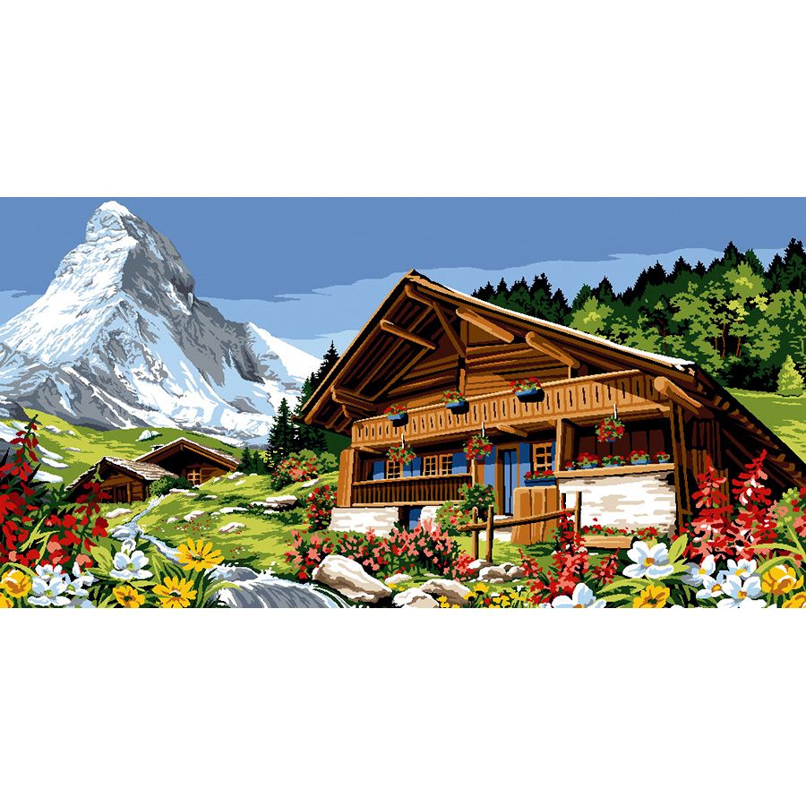Grande chalet con fiori sui monti