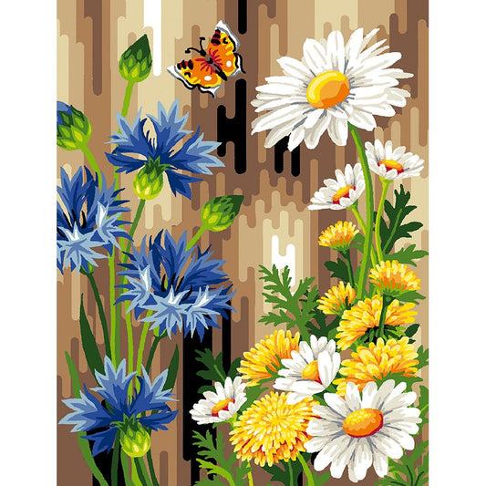 Margherite tra fiori gialli e blu