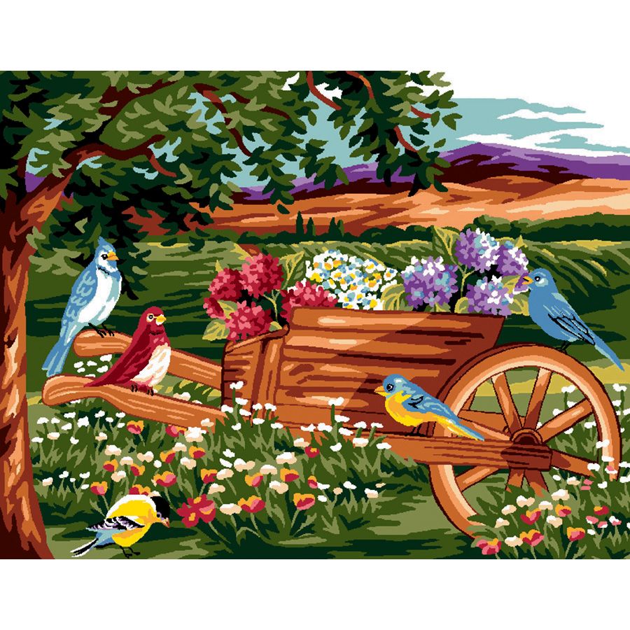 Gli uccellini sulla carriola di fiori