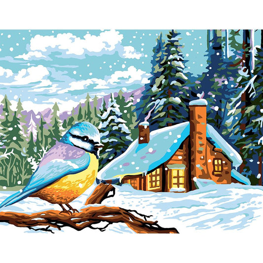 L'uccellino sul ramo sotto la neve