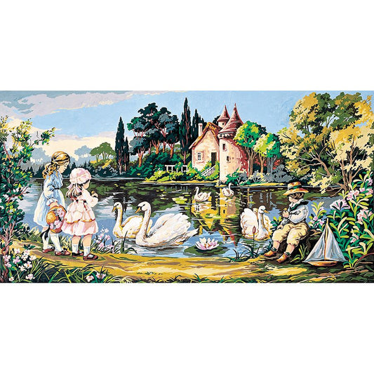 Bambini e cigni sul laghetto