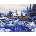 La casa innevata sul lago