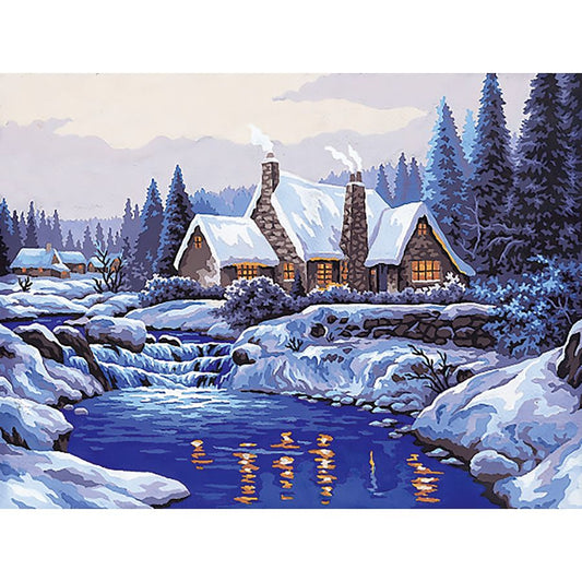 La casa innevata sul lago