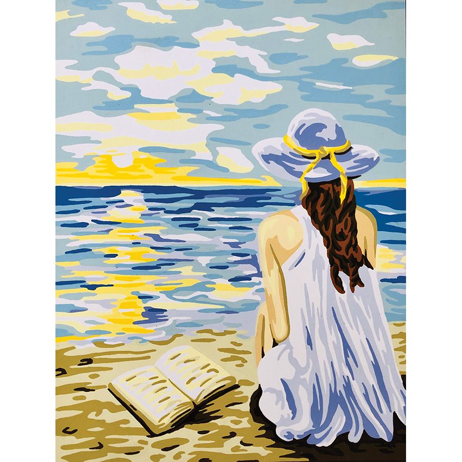 Lettrice sulla spiaggia