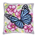 Farfalla blu tra i fiori
